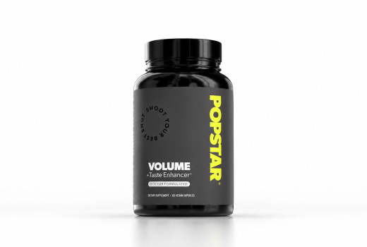 Popstar Volume + Taste supplement bottle on a clean white background