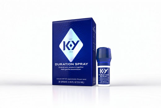 K‑Y Duration Delay Spray blue carton and bottle on a white studio background.